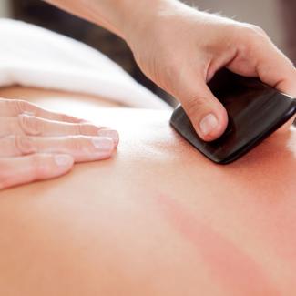 Gua Sha - Back being treated